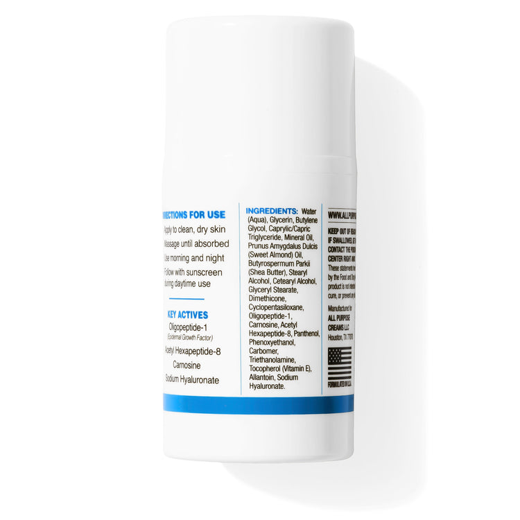A white cylindrical cosmetic stick container with blue and black text, photographed on a clean white background with a soft shadow.